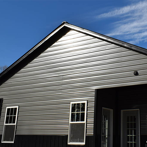 Water ripple metal wall panel on the exterior wall of the house Water ripple metal wall panel on the exterior wall of the house